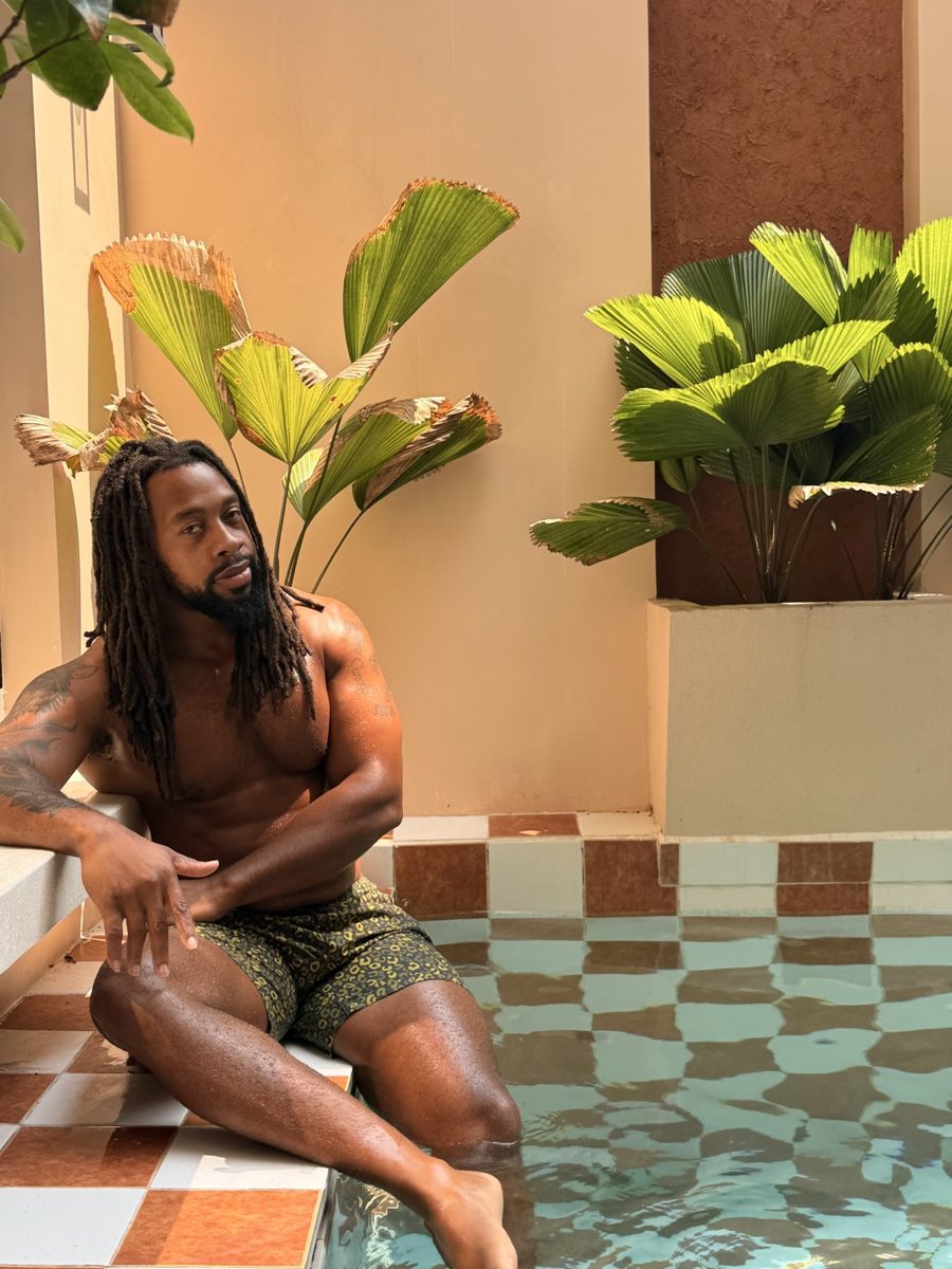 Quan on location at a pool