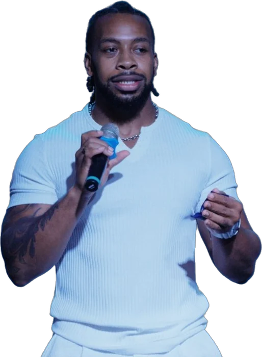 Quan on the mic at an activation
